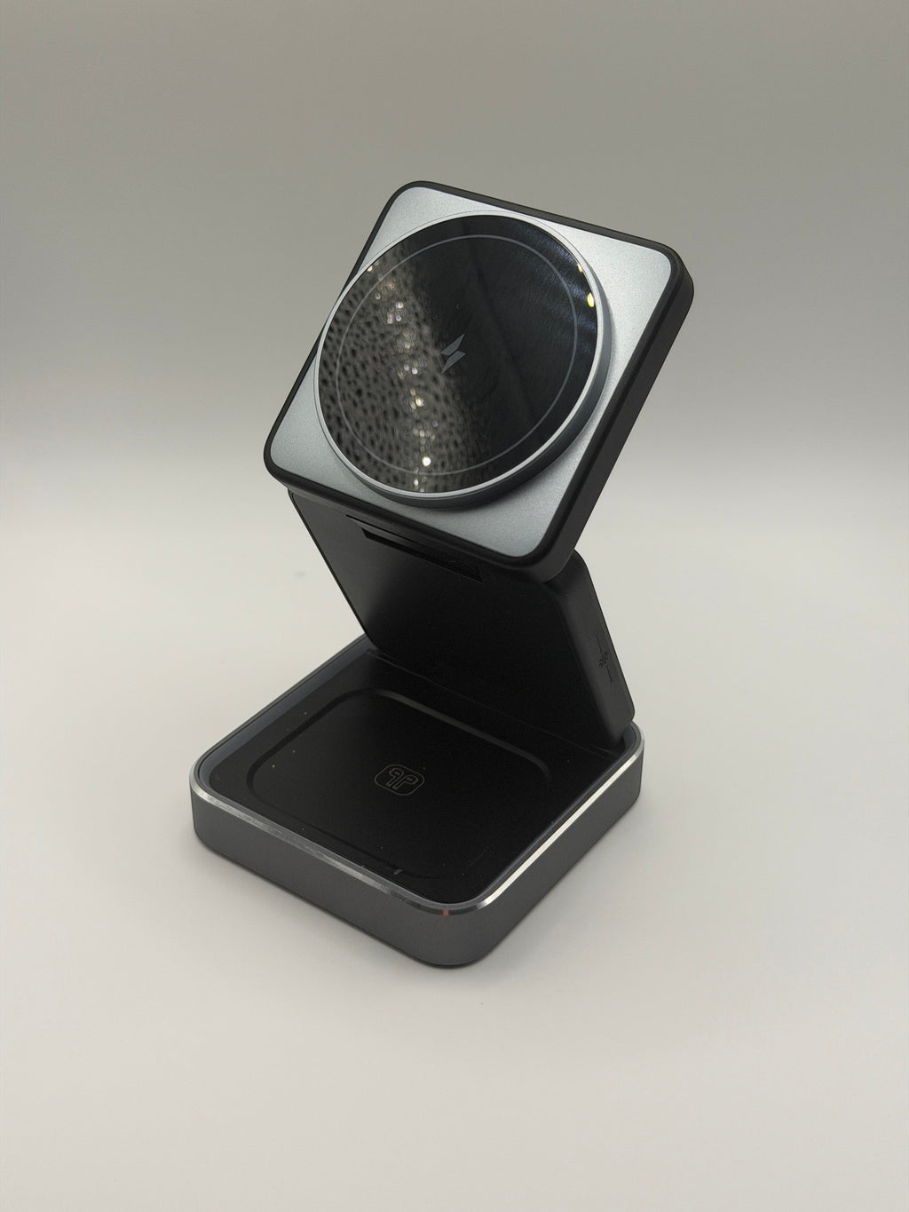 GLOVOYAGE™ 3-in-1 foldable wireless charging station in grey with magnetic phone mount and earbud charging base.