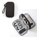 GLOVOYAGE™ black double-layer travel tech organizer with mesh pockets and elastic straps for cables and chargers.