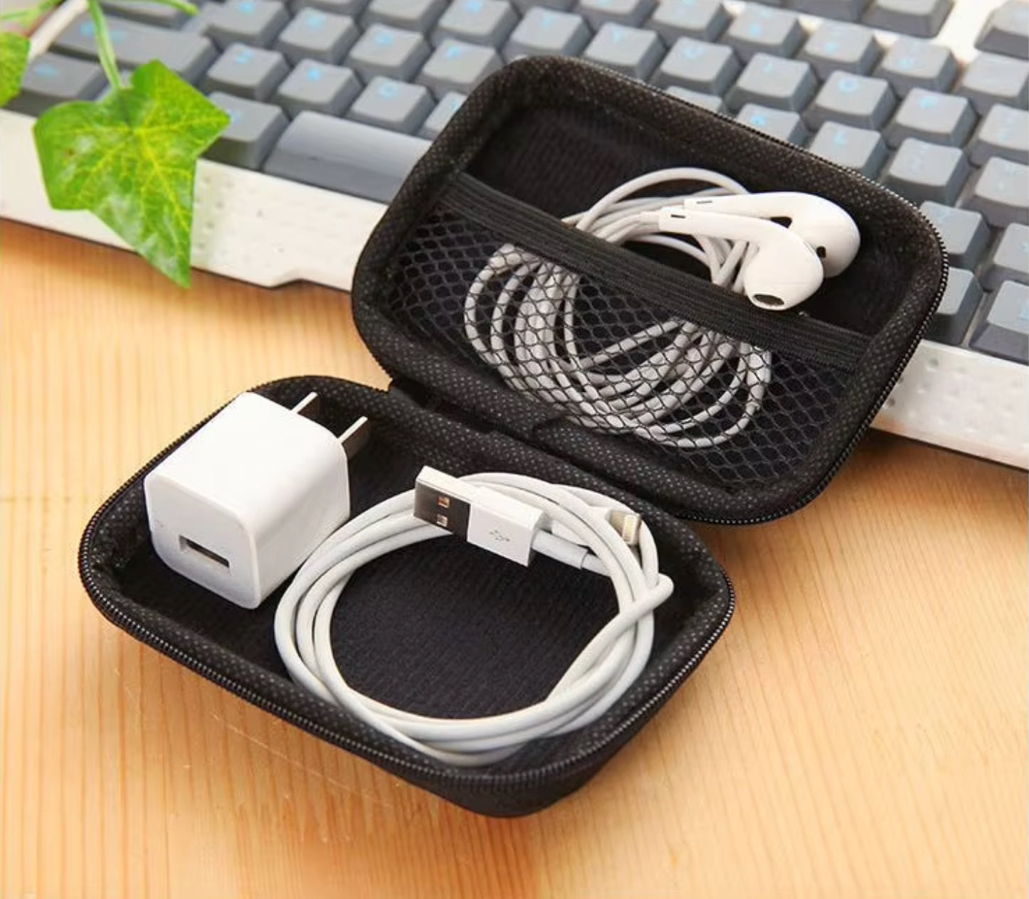 GLOVOYAGE™ Flight Ready Audio Kit featuring white USB-C earbuds and charging cable inside a black EVA hard shell case.