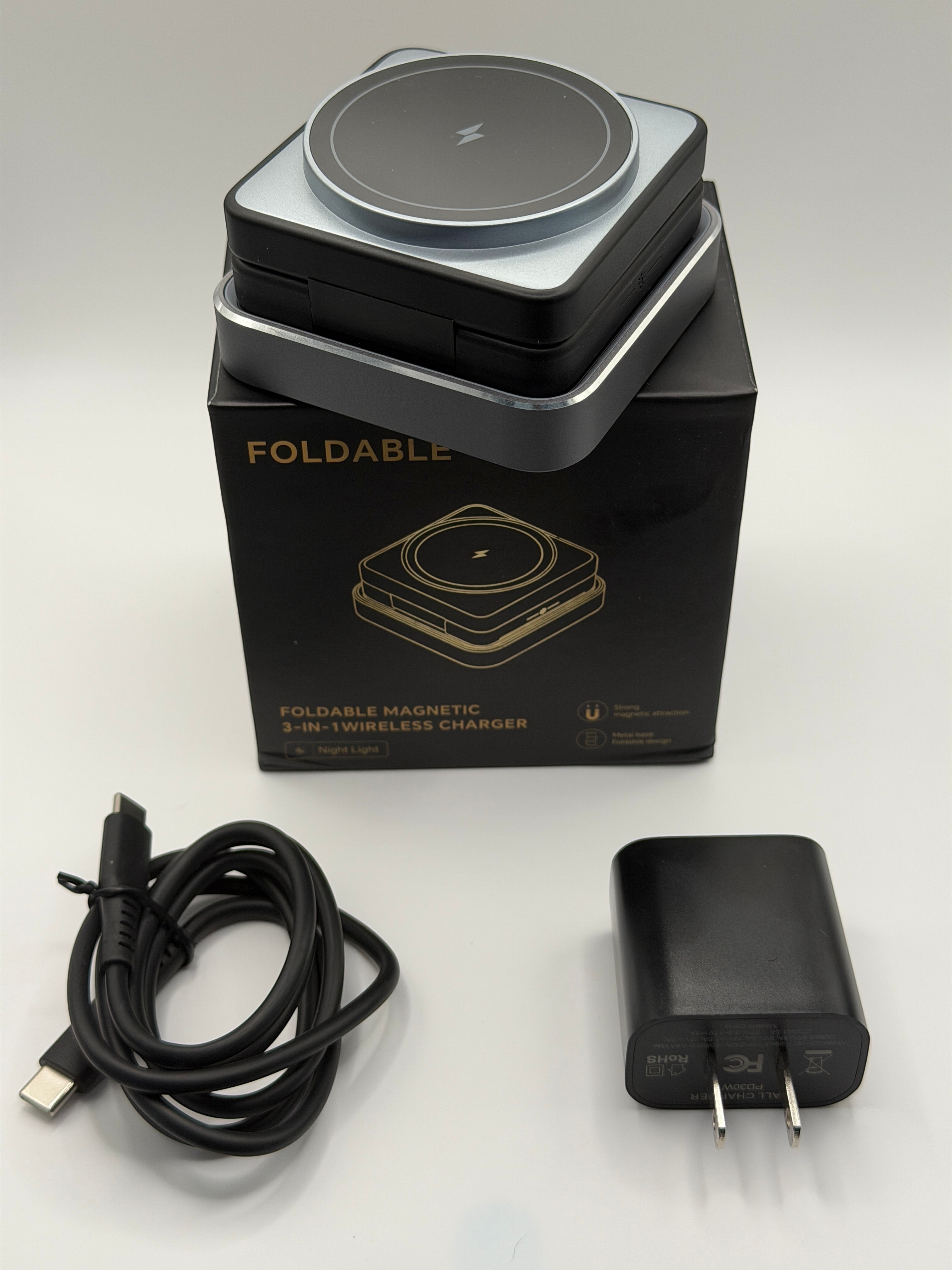 GLOVOYAGE™ 3-in-1 foldable magnetic wireless charging station in grey with USB-C cable and power adapter.