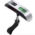 GLOVOYAGE™ portable digital luggage scale with a silver body, black strap, and clear LCD display for travel weighing.