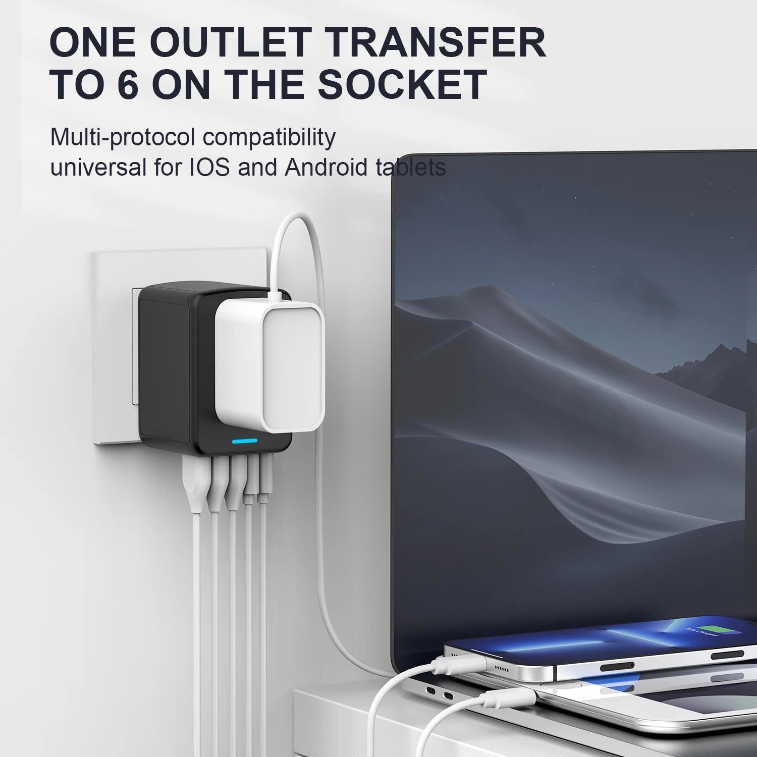 GLOVOYAGE™ 35W universal travel adapter in black, plugged into a wall outlet charging multiple devices simultaneously.